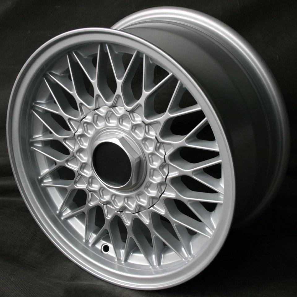 15 Zoll Felgen Kreuzspeiche 7x15" 4x100 ET24 57,1 Silber BMW Opel VW 15202-20... - Bild 1 von 1