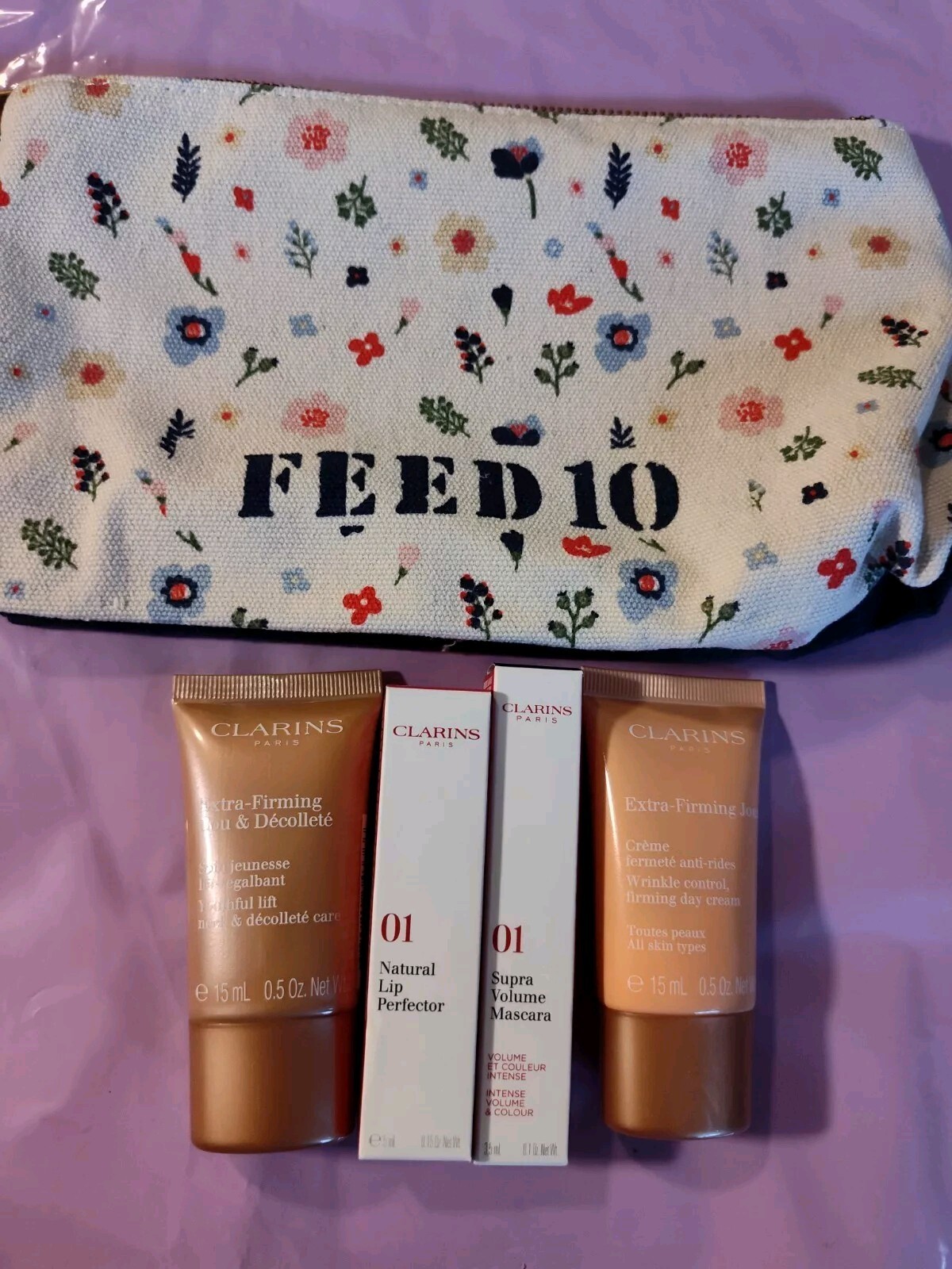 Clarins Cosmetic Bag With 4 Beauty Products And 2 Samples