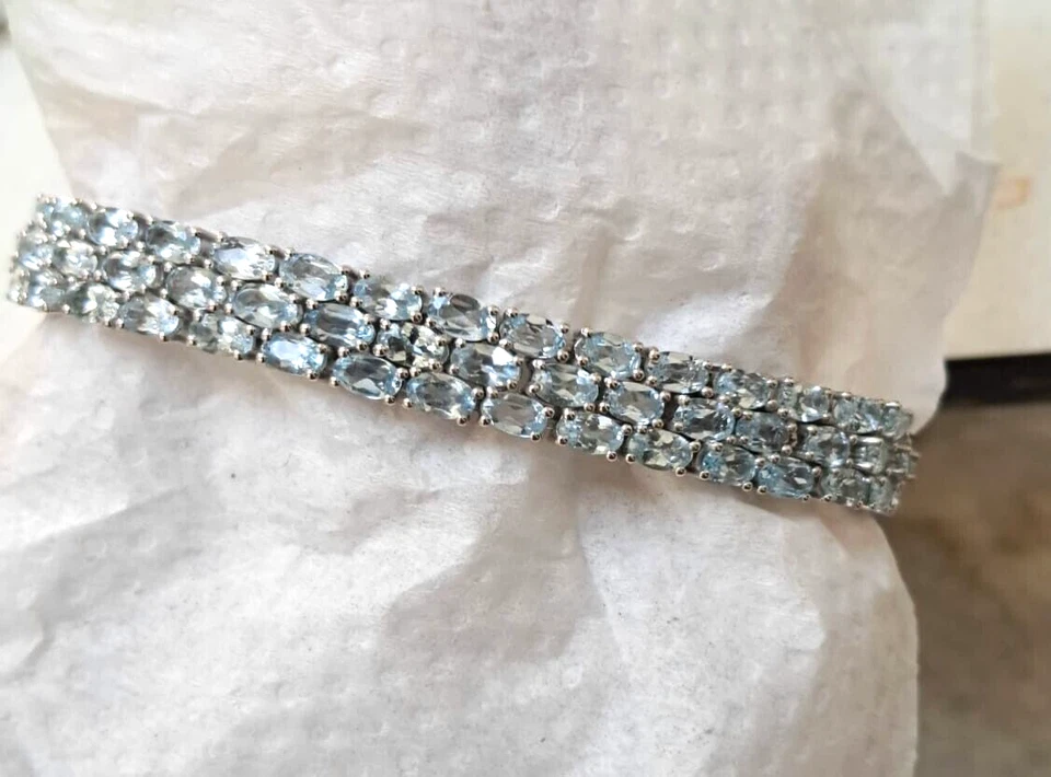 Brazalete de tenis de tres filas de topacio azul platino sobre plata de ley 6,5 pulgadas Foto 4 de 4