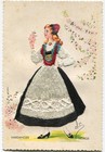 Woman in costume Hardanger embroidered in white, black, red, blue & gold thread — photo 1