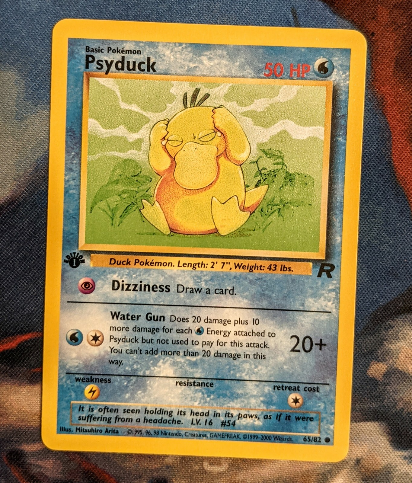 Psyduck 65/82 • 1st Edition • Team Rocket • Near Mint Pokemon Card