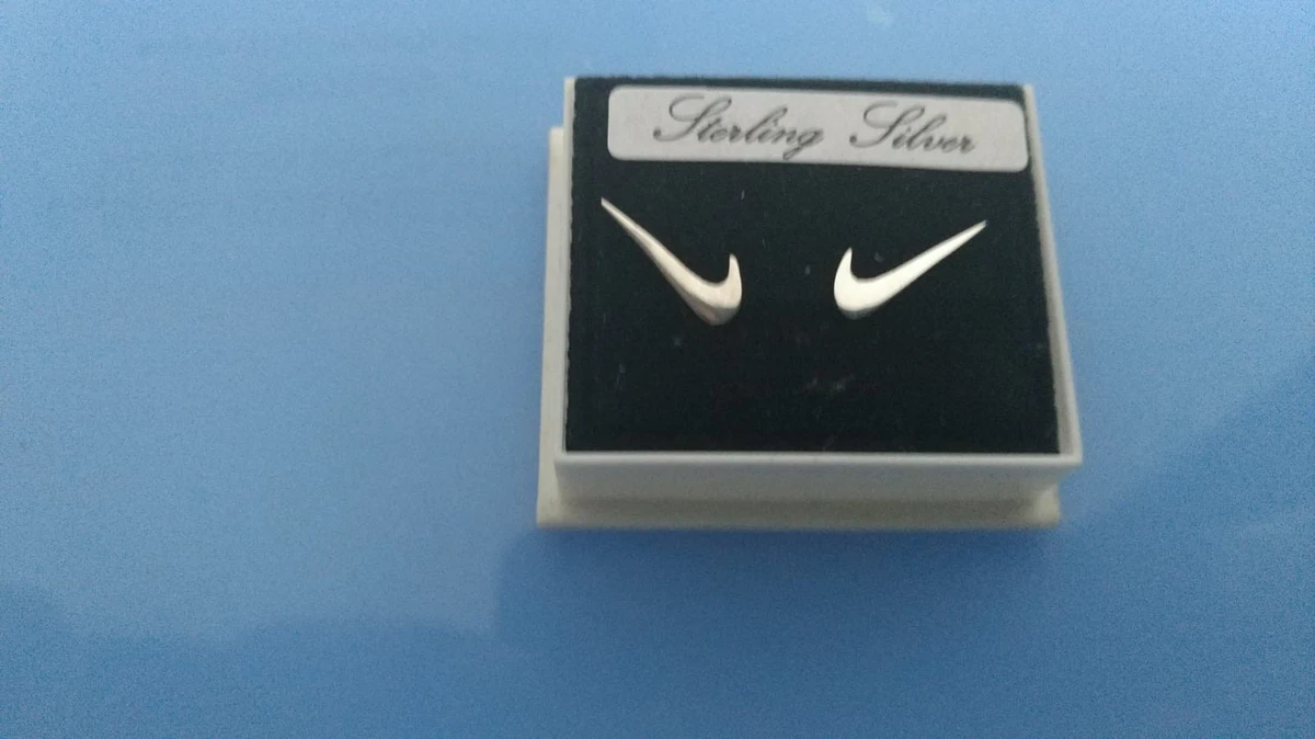 Pair of silver sterling medium Nike Swoosh symbol stud earrings eBay