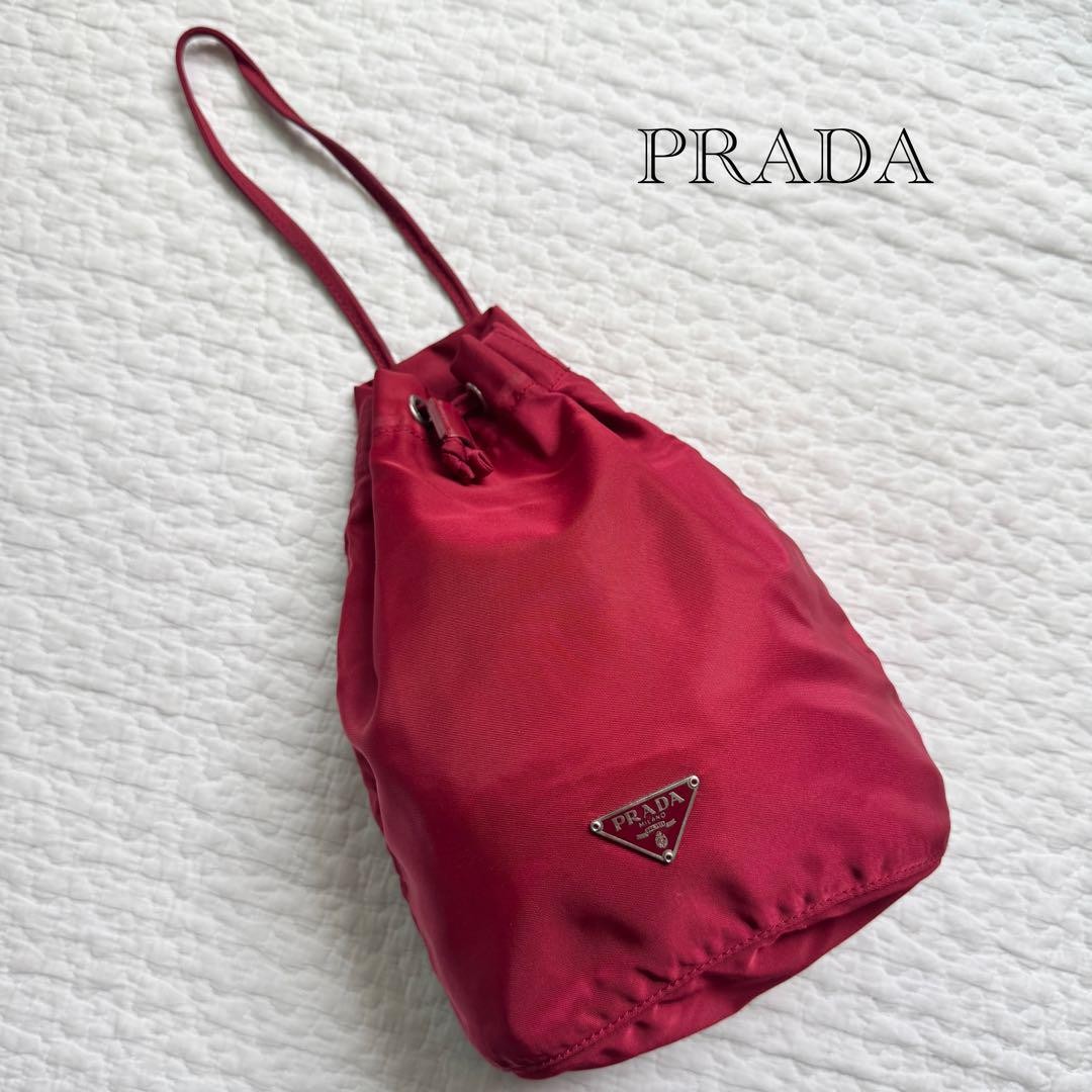 Prada red nylon drawstring bag with triangular logo plate - excellent condition