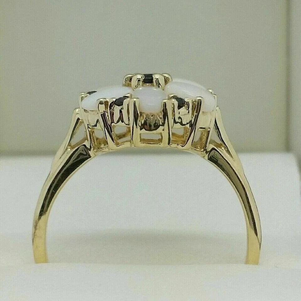 Anillo de compromiso de ópalo de fuego y zafiro azul de corte ovalado de 2 quilates de oro amarillo de 14 quilates Foto 4 de 4