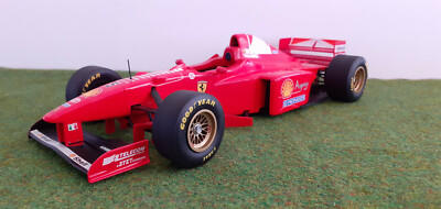 輸入本 FERRARI FORMULA1 1997 フェラーリ フォーミュラ F1 FERRARI 1997 F310B #5 SCHUMACHER sans pil 1/18 MINICHAMPS
