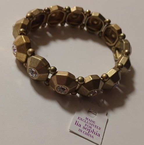 LIA SOPHIA BRUSHED GOLDTONE CRYSTAL STRETCH BRACELET - Picture 2 of 4