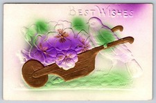 Best Wishes Postcard 1900s Airbrushed Embossed Bird Pushing Floral Wheelbarrow