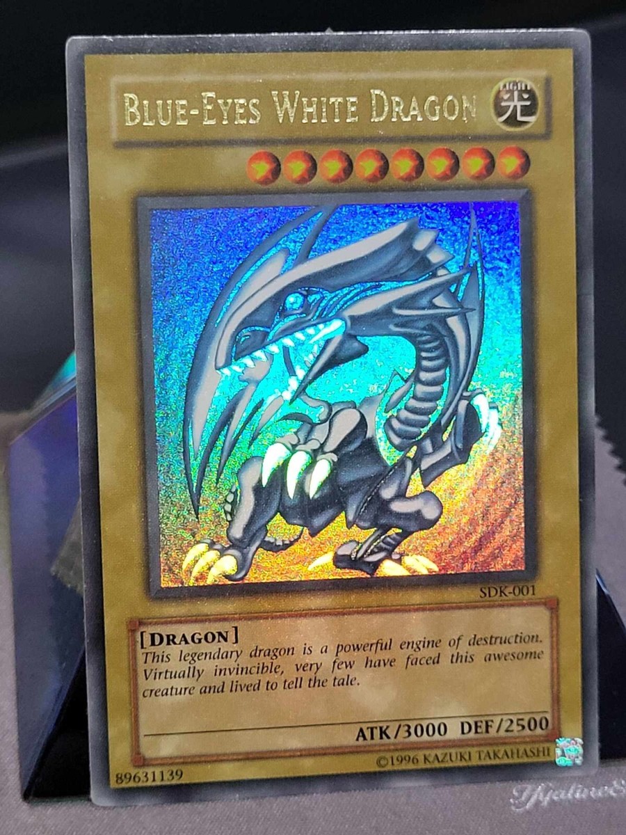 2002 Yugioh Blue-Eyes White Dragon SDK-001 Ultra Rare Holo Bleed