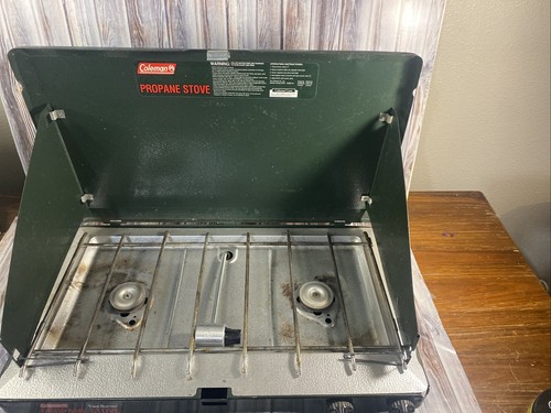 COLEMAN TWO BURNER GREEN PROPANE CAMPING STOVE MODEL# 5430B700 - Đức An Phát