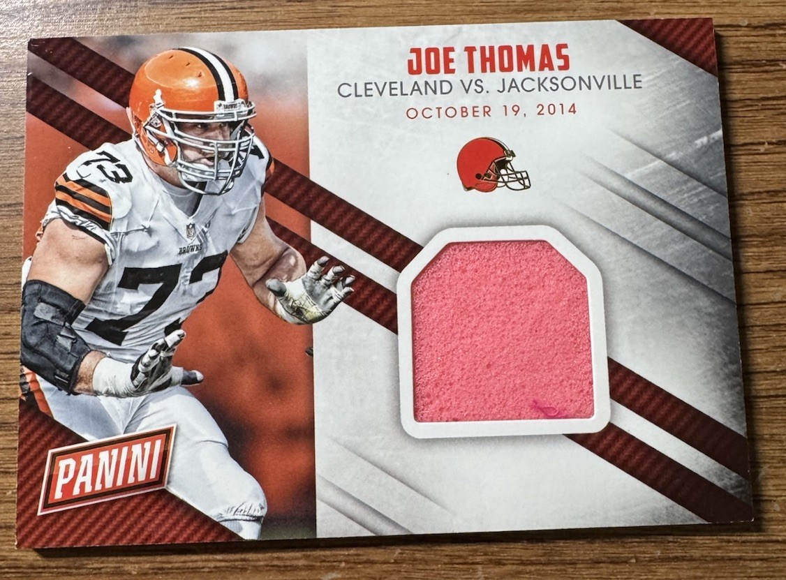 2016 Panini Day - Game Dated Materials Joe Thomas #13 Patch Game Used Pylon