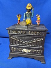 Cast Iron Organ Bank “The Book of Knowledge” Reproduction Mechanical Coin Bank