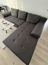 Graues Sofa mit Schlaffunktion.                                        400€