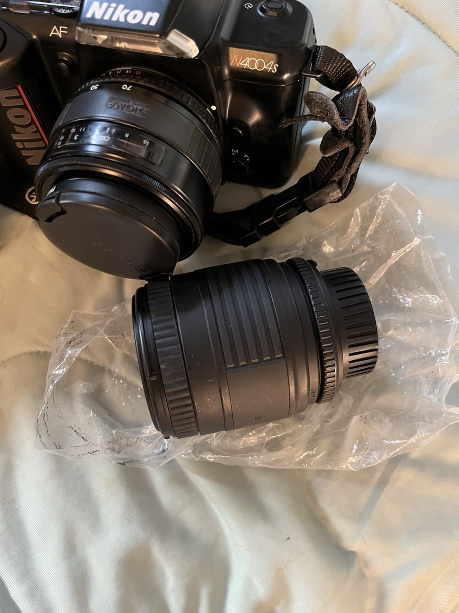 Nikon N4004 35mm SLR Film Camera With Carrying Case And Extra