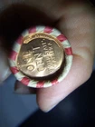 WHEAT PENNY ROLL WITH A UNKNOWN BU WHEAT PENNY SHOWING