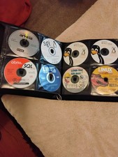 ESTATE SELL OFF- HUGE BINDER FULL OF LINUX CD'S- YOU CHOOSE-PROTECTED- vtg-SAVE 