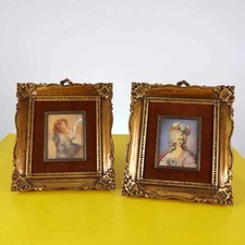 coppia di quadri con cornice in legno