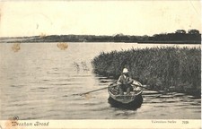 Bearded Man Boating Along River Bure, Wroxham Broad, Norfolk, England Postcard