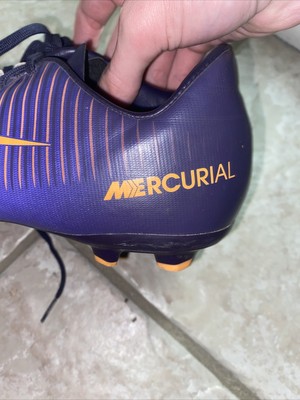 Botines de fútbol Nike Mercurial y naranja talla 5 años limpios |