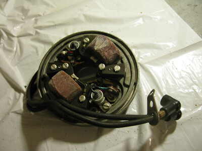 1950s Johnson 5.5 hp model CD-12 or fisherman ignition plate 303470