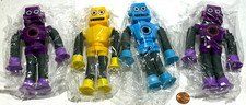 4 Pack Suction Cup Robot Toys Blue, Yellow, + (2) Purple