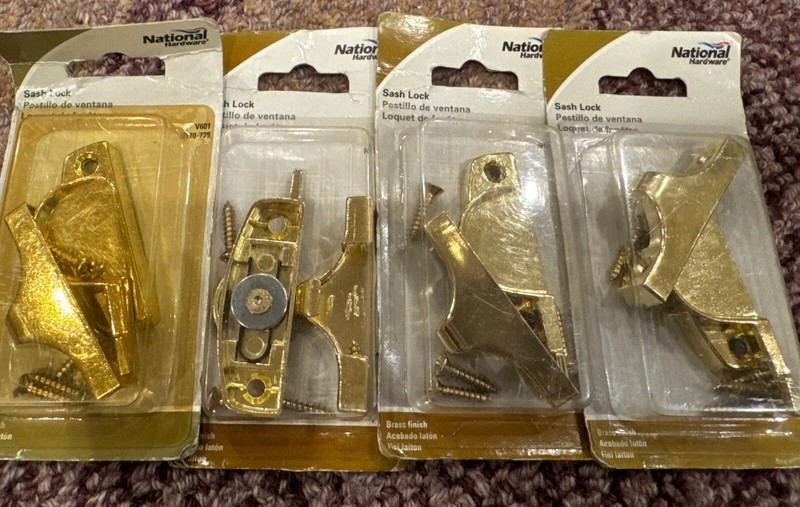 (4) NATIONAL H/W SASH LOCKS BRASS FINISH V601 N170-779
