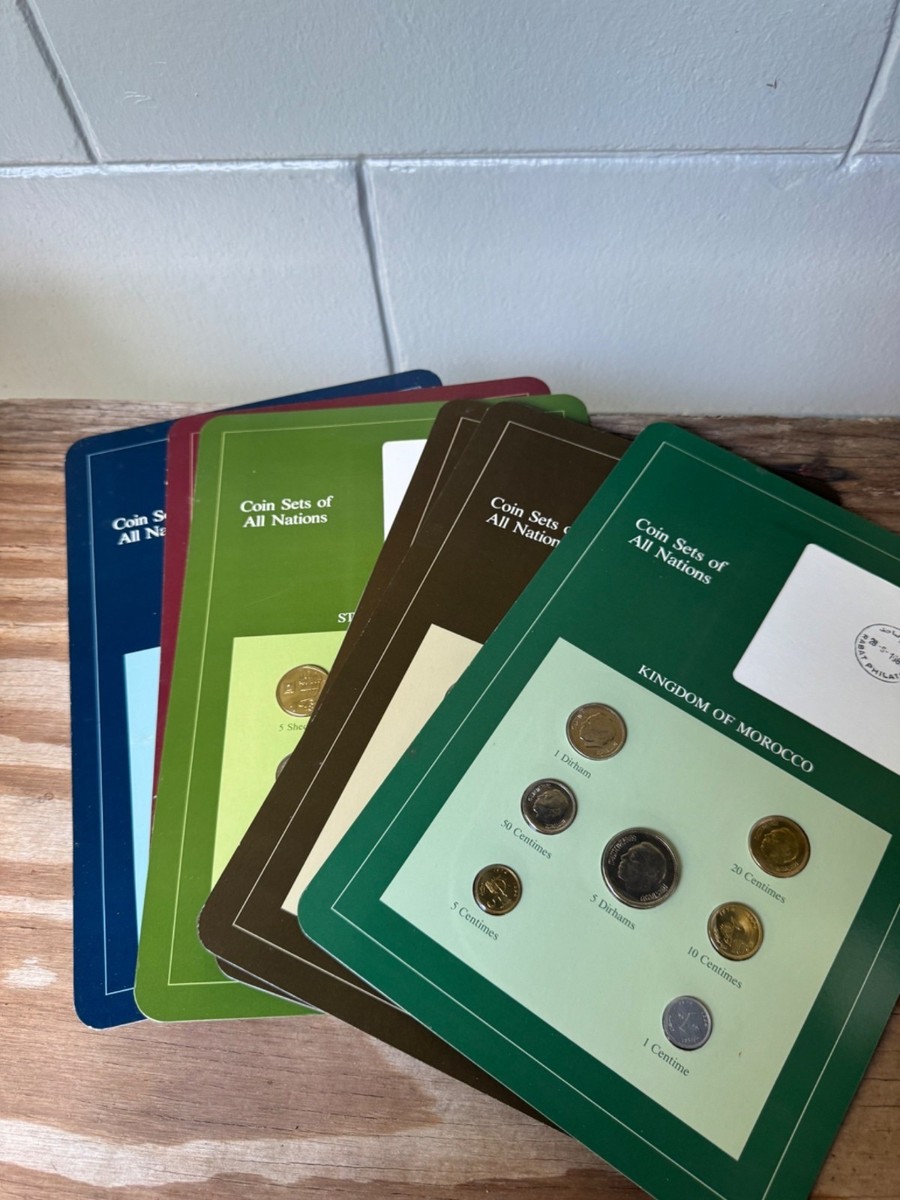 ◯ COINS OF ALL NATIONS VOL. I & IV Lot - COINS: Franklin Mint's 