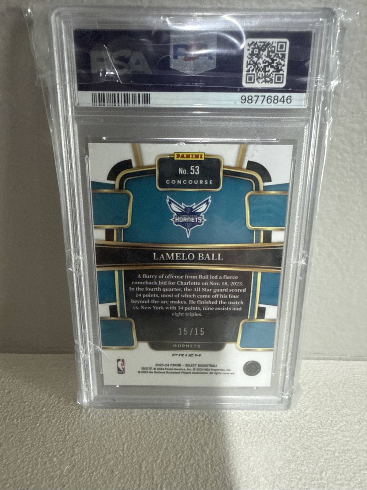 2023-24 Panini Select -LaMelo Ball Neon Orange Pulsar Prizm PSA 9. Bookend 15/15 view 2