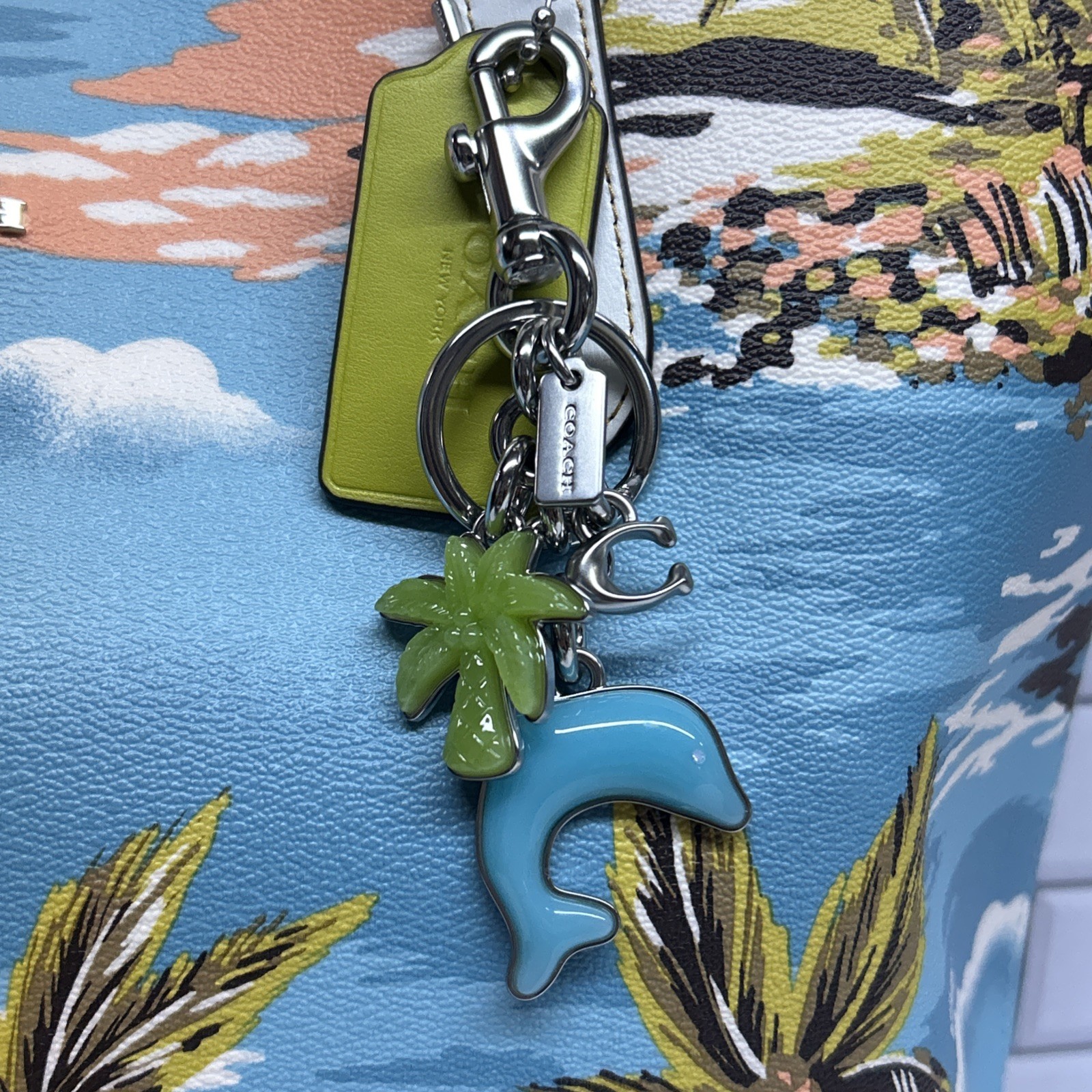 COACH Dolphin Palm Tree Bag Charm