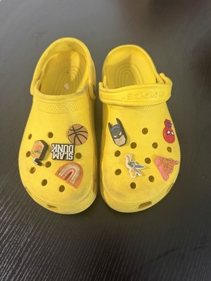 Crocs Bright Yellow.. Rare Size Men 6 Woman 8 with lots of jibbitz