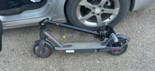 Electric Scooter with Folding Design and Red Accents Top Speed Is 19 Mph