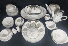 A Vintage Japanese Porcelain Dinner Service with Tea Set for Six