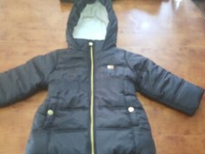 Tommy Hilfiger hooded puff quilt winter jacket Youth Girl Color black size 2T.