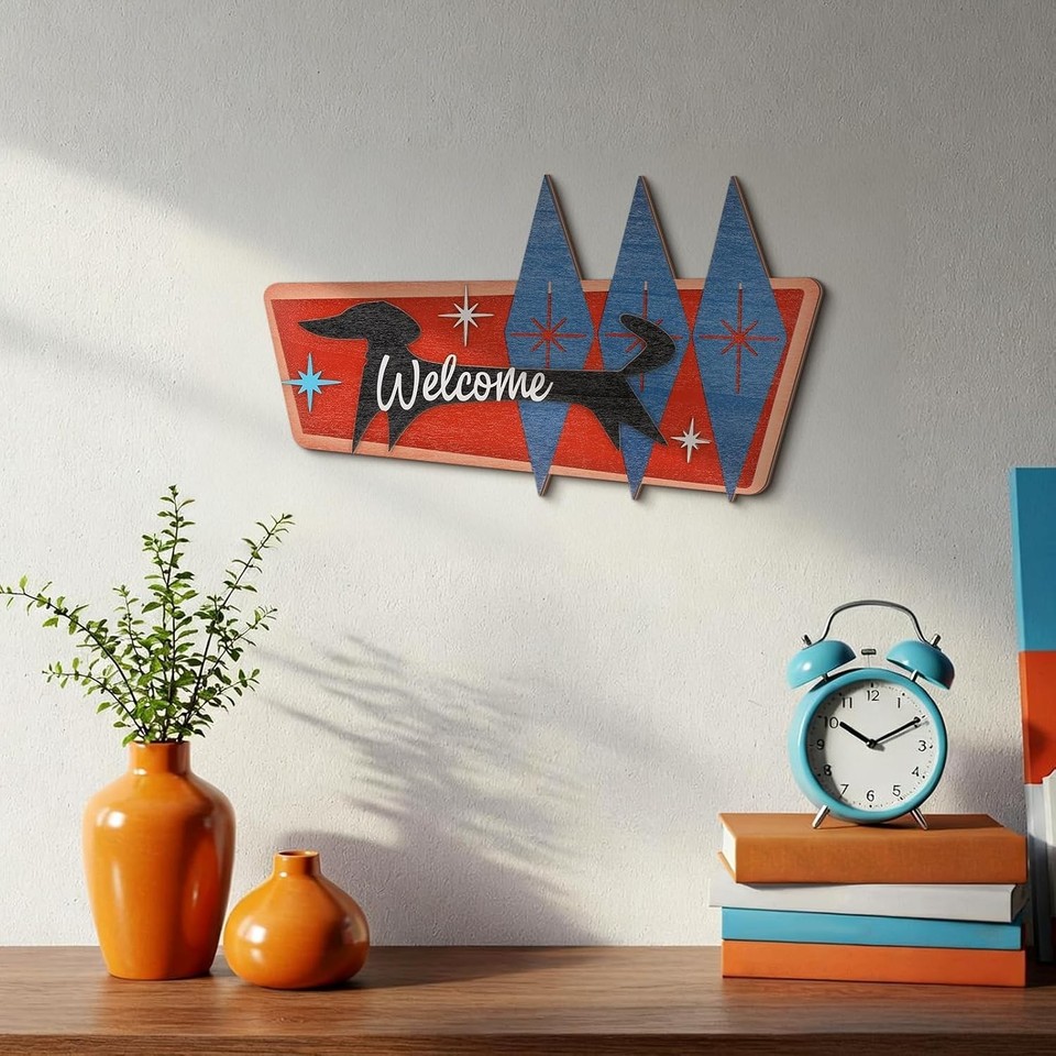 Atomic-age starburst meets dachshund silhouette — a laser-cut wooden wall piece that hits the sweet spot between mid-century kitsch and dog-lover charm.