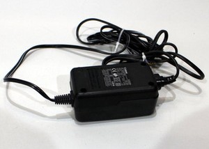 04-16-02997 Netzteil 13,5V- 1A / 5mm Stecker CANON K30081 AD-300 230V~ 0,135A 