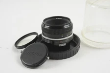 Nikon Nikkor 50mm 2.0 Non AI w/Filter/Cap & Globe