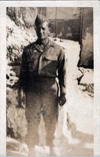 WW2 Photo Of US Army Soldier Full Length In Alleyway Amid Rubble