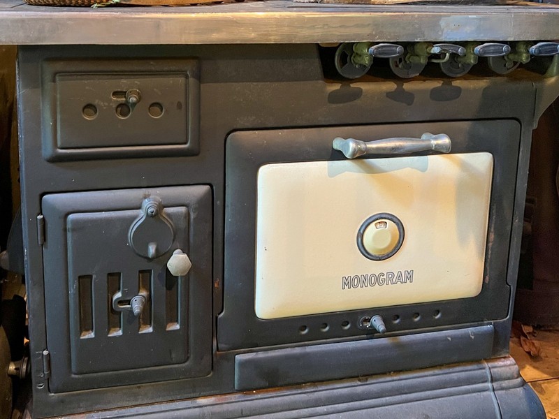 Monogram Combination Wood/Propane Cookstove. Cast-iron, enamel and stainless.