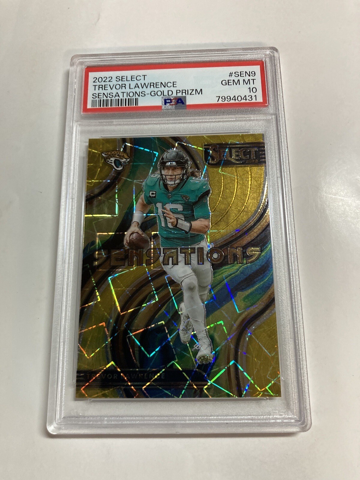 Psa 10 2022 select Trevor Lawrence sensations gold prism 4/10