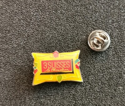 Pin's les 3 suisses le chouchou catalogue - pin badge Pins L14