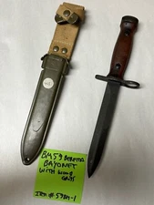 ITALIAN ARMY BAYONET WOOD GRIPS COMPLETE WITH SCABBARD.
