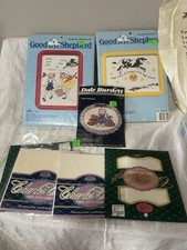 Three Unopened Cross Stitch Kits And Extra Material