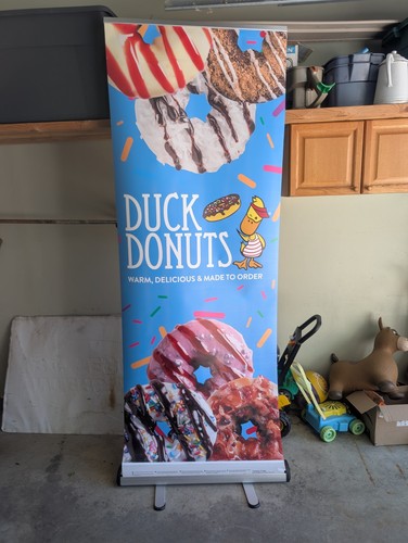 Artistic Displays By Bernini Carrying Case Bag Stand And Duck Donuts Poster Sign