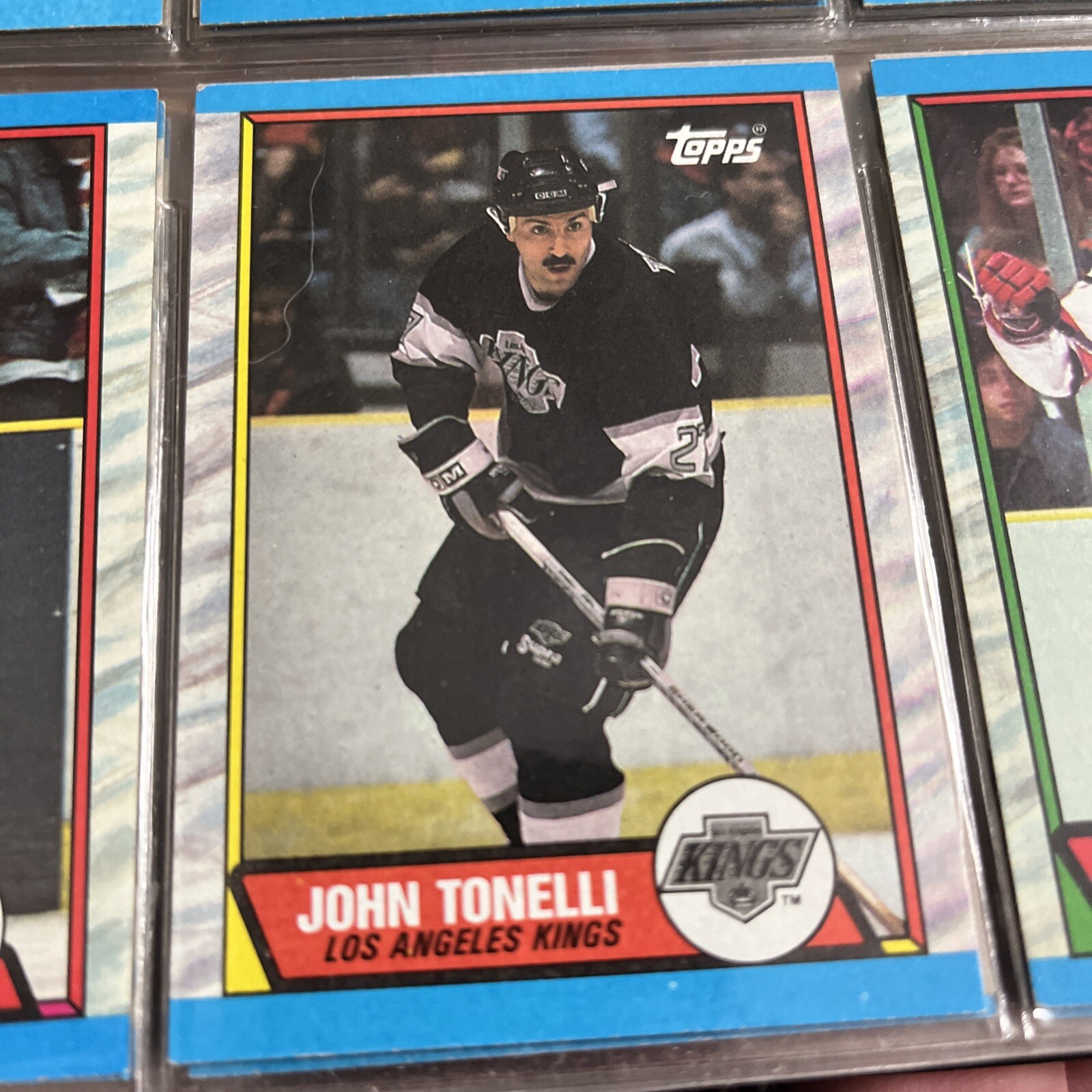 John Tonelli #8 Hockey Cards 1989 Topps trading card — raw and PSA graded price guide