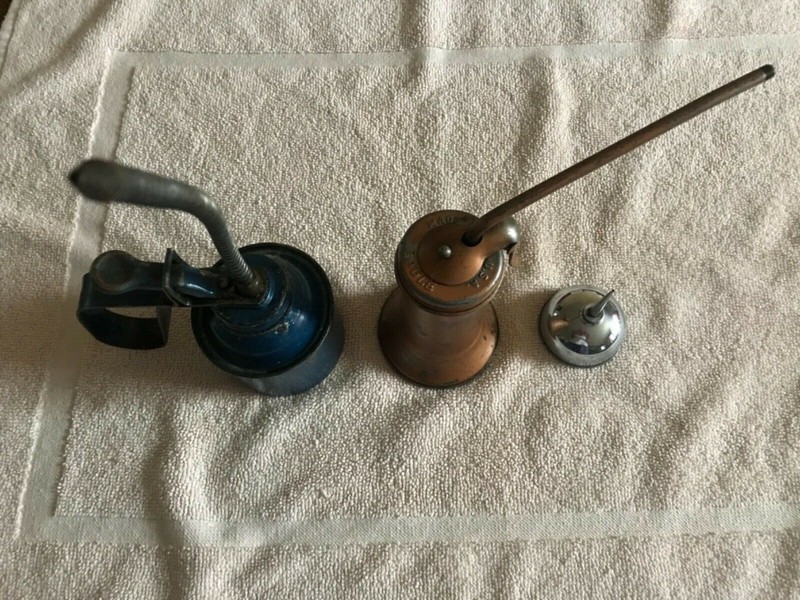 Vintage Thumb Oil Cans