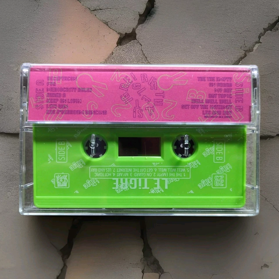 Le Tigre Great Hits Cassette Tape Rare Hot Pink Lime Green 2023 Brand New - Image 4 of 4