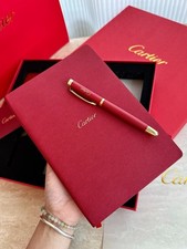 Cartier red striped ballpoint pen notebook se...