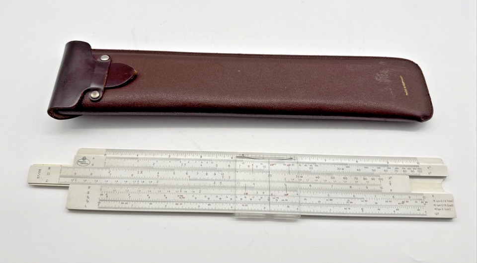 Cold War-era West German precision instrument — a fully mechanical analog calculator in a leather case that engineers once staked careers on.