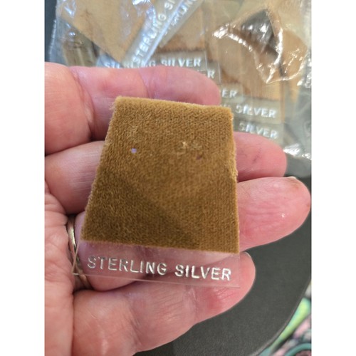 Vintage Velvet Tan earring cards that say sterling silver