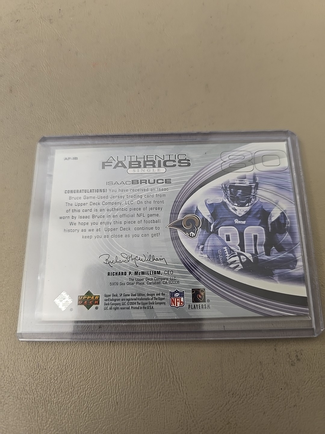 2004 ISAAC BRUCE SP GAME USED JERSEY CARD. STL.RAMS.  view 2