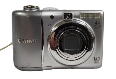 Working Canon PowerShot A1100 IS 12.1MP Silver Digital Camera 4x